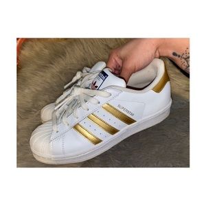 Gold Adiddas Superstars
